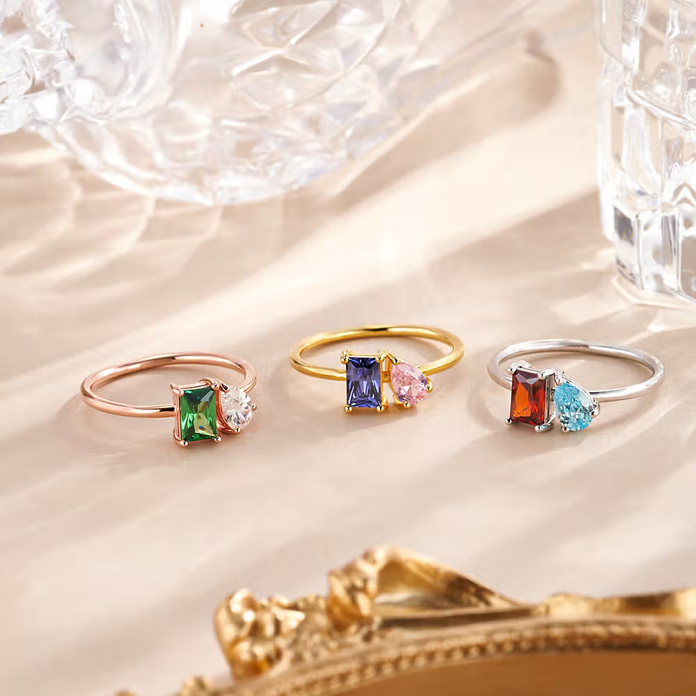 Un simbolo d’amore unico: l’anello con doppia pietra di nascita
